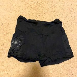 Black Doughnuts & Deadlift booty shorts with pockets